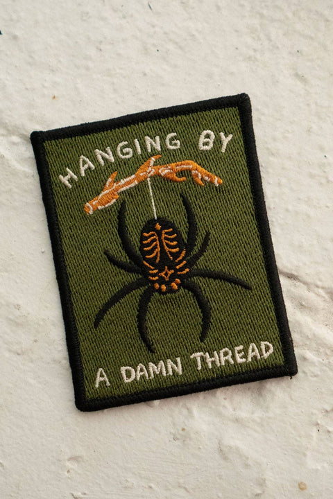 Hanging By A Thread Embroidered Sticky Patch